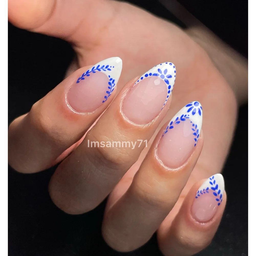 Intricate blue nail artistry